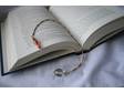 This hand crafted book mark is made up of silver and copper