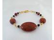 Red jasper accented with black glass beads and gold plated
