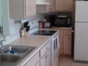 FRIDGE AND GLASS TOP STOVE IN EXCELLENT WORKING CONDITION