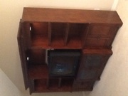 Wall shelving unit with walnut finish
