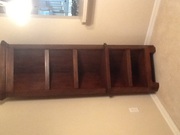 Corner wall shelving unit