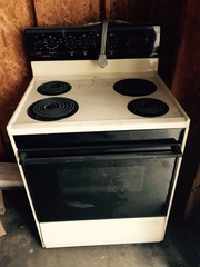 Almond electric tapped stove